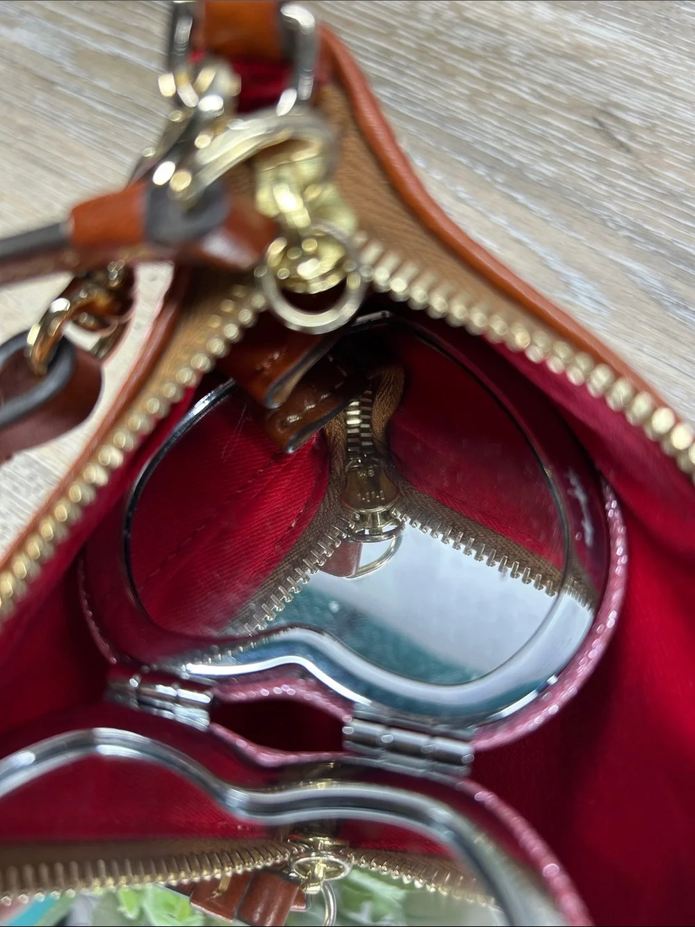 3661 Dooney & Bourke Brown Leather Wristlet with Red Lining 053661